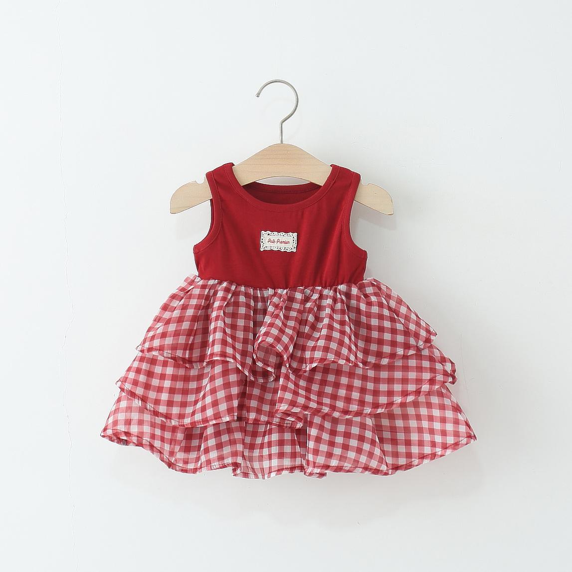 Vestido rojo , sin manga detalle de cuadros rojo y blanco con bolados en la falda