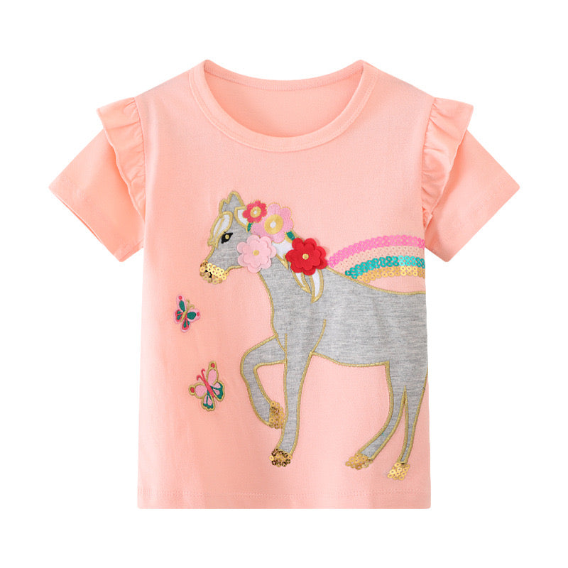 Remera de algodón detalle de unicornio y lentejuelas