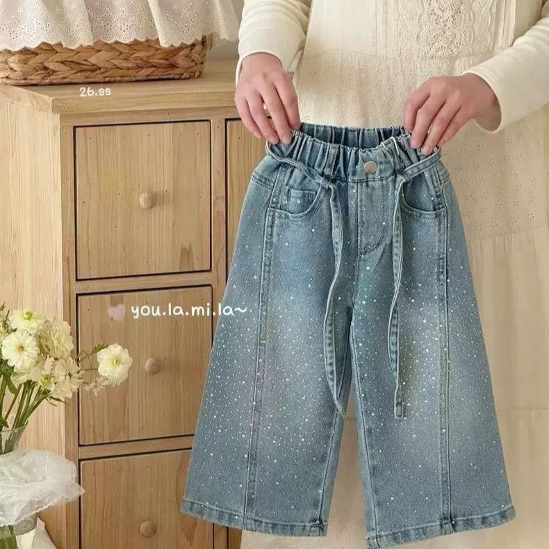 Pantalón de jeans estilo overside con detalle de brillos ( no incluye cinto )