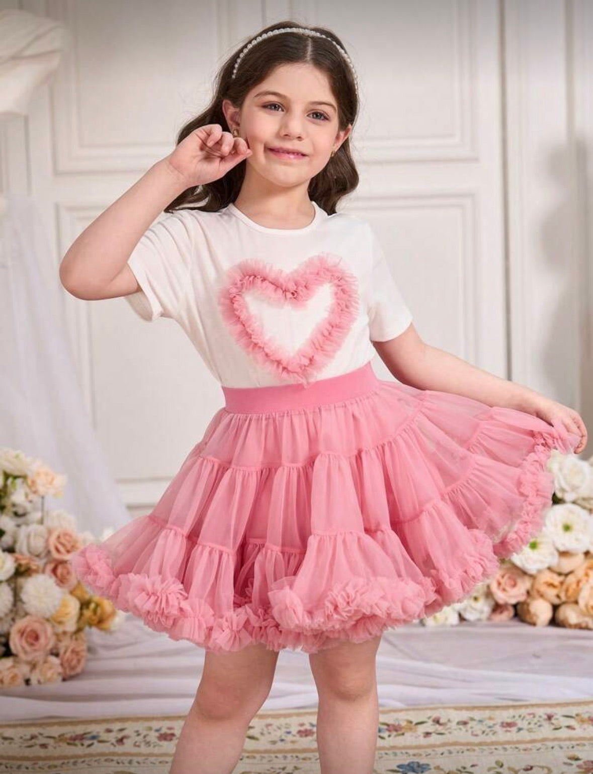 Conjunto tutu rosa con remera detalle de corazón