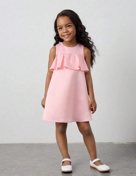 Vestido rosa con moño brilloso en la espalda