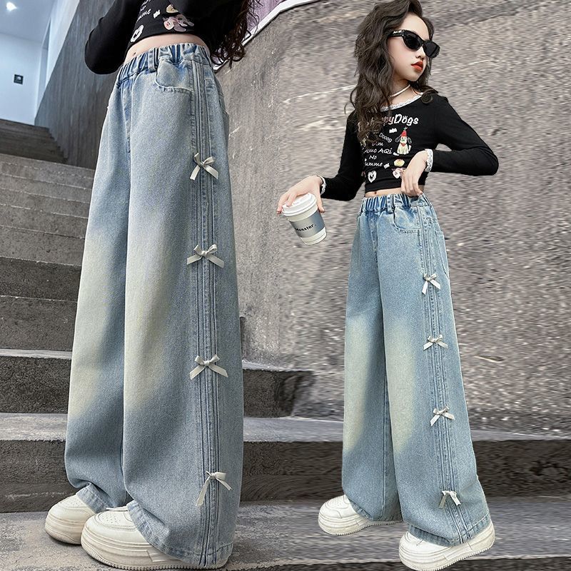 Pantalón de jeans estilo overside con detalles de moños y prelavado más claro