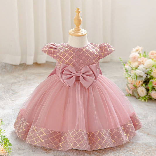 Vestido elegante color rosa vieja detalles de lentejuelas y moño grande en la espalda