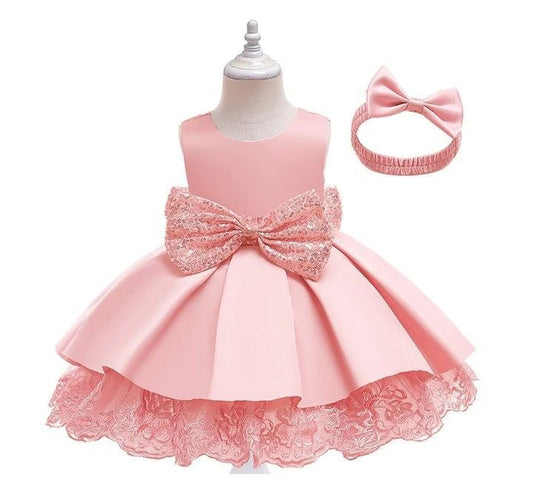 Vestido elegante para bebé , rosa con lentejuelas , incluye vincha