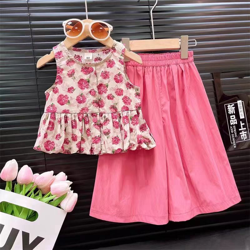 Conjunto palazo con blusa floreada rosa