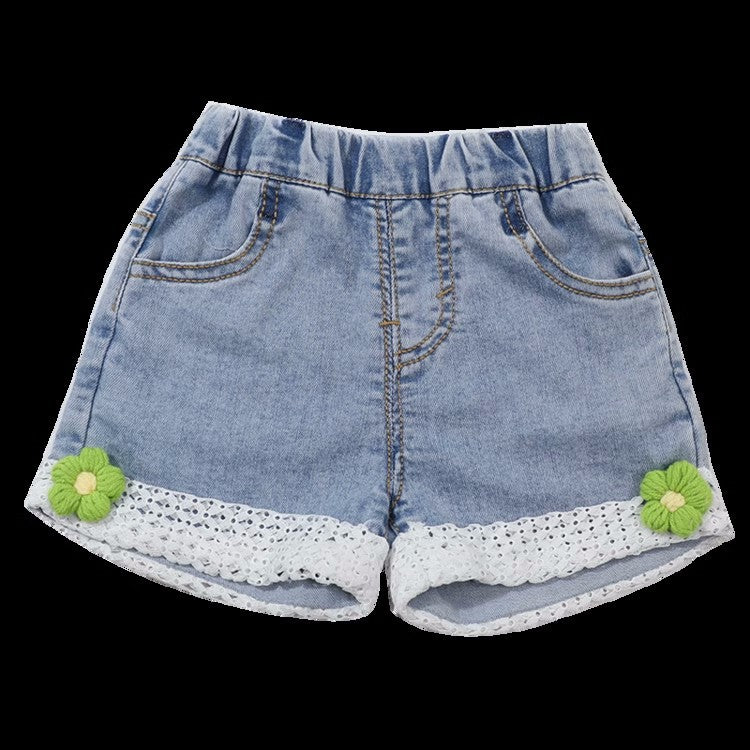 Short de jeans con detalle de flor