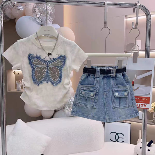 Conjunto pollera de jeans con blusa detalle de mariposas  (sin cinto)