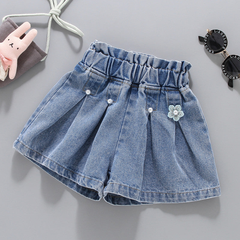 Short de jeans tableado con perlas y flores