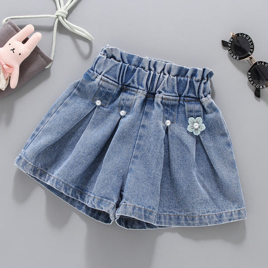 Short de jeans tableado con perlas y flores