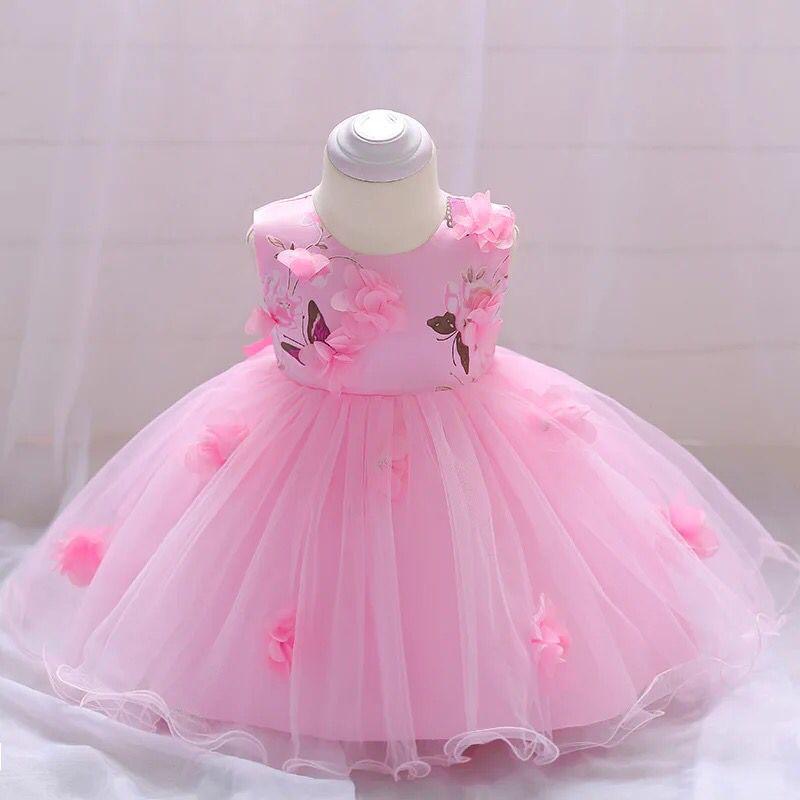 Vestido elegante para bebés , colores rosa con detalles de mariposas y flores en 3D